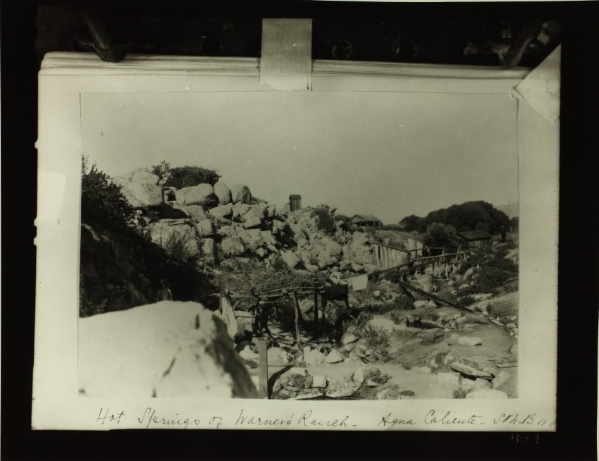 Old photograph of rocky landscape with traditional and 19th-century structures